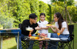 © atitaph - Asian family happy bright cute daughter Barbecuing in the courtyard