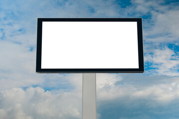 Wall Mural - mock up - blank horizontal white billboard or large advertising display against blue sky with white 