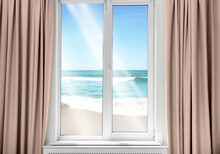 Beautiful View Of Sandy Beach Washed By Sea On Sunny Day Through Window