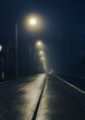 © Southern Creative - Foggy misty night along a city street