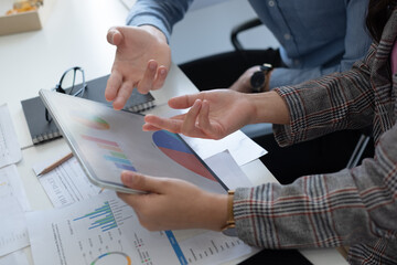 Leinwandbilder - Young business team working with business report document on office desk. Brainstorming Business People Design Planning, Brainstorming Planning Partnership.