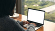 women using laptop showing white screen on desk