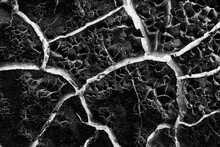 Abstract Black Background With White Cracks Overlay Ground Cracked Drought, Old Paint