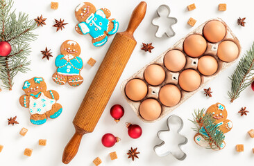 Poster - Flat lay christmas background. Cooking gingerbread concept. Xmas holiday cookies on white background top view