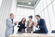 © Danai - Diversity group of business people smiling happy celebrating success work in modern office