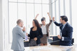© Danai - Diversity group of business people smiling happy celebrating success work in modern office