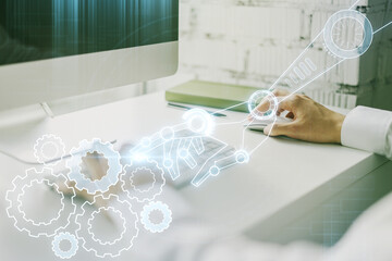 Aufkleber - Creative abstract robotics technology hologram and hands typing on computer keyboard on background, artificial intelligence and machine learning concept. Multi exposure