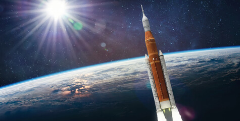 Leinwandbilder - Spaceship launch from Earth. Artemis space program. Expedition to Moon. Space launch system SLS. Elements of this image furnished by NASA
