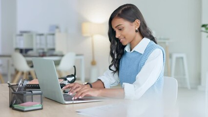 Aufkleber - Young woman happily doing business and networking by email on laptop. Professional female is stylish and creative while being alone in office. She is using technology to advance her career