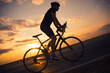 © Solid photos - Young sports man cycling with bicycle on the road in summer