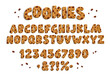 © Olga - Chocolate chips cookies font on light background. Sweet food alphabet. Isolated vector sign symbol. Art collection. Chocolate drops.