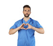 © New Africa - Doctor making heart with hands on white background