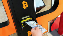 Atm Machine Bitcoin Cryptocurrency. Usd Hundred Money Payment On Virtual Crypto Currency Btc Wallet. Woman Withdraw American Dollar Bill Money. Atm Machine Finance And Technology Concept.