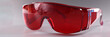 © H_Ko - UV protective goggles on gray background. Laser eye protection