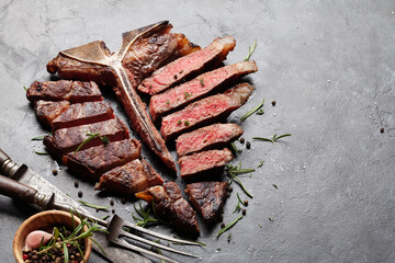 Wall Mural - Grilled porterhouse beef steak. Sliced T-bone