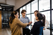 © Westend61 - Businesswoman explaining colleagues in office