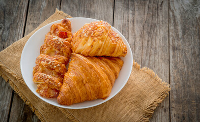 Poster - croissant in a white disk