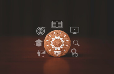 Poster - Drawing technical gear lamp with education icons print screen on round wooden block for study and learning can make creative thinking idea and knowledge to problem solving concept.