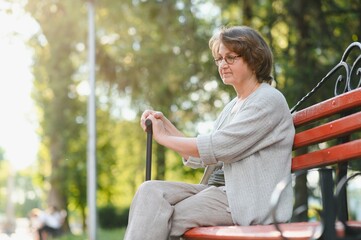 Sticker - Portrait of a happy Senior woman in summer park