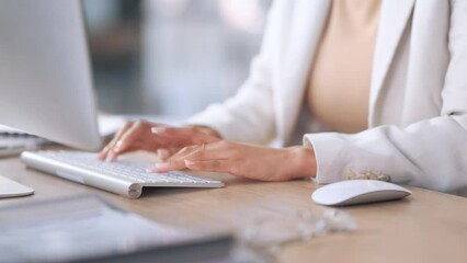 Aufkleber - Closeup of a receptionist typing and sending emails while working in an office alone. One secretary doing admin and writing reports while organizing a schedule for her manager at work