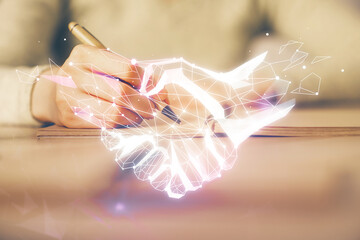 Poster - Handshake drawing over hands taking notes background. Concept of success. Double exposure