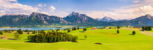 Panoramic Landscape With Meadow And Mountain