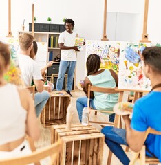 Sticker - Group of people smiling happy drawing in paint class at art studio.