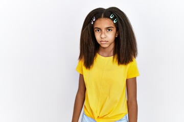 Sticker - Young african american girl standing over white isolated background skeptic and nervous, frowning upset because of problem. negative person.