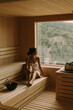 © BGStock72 - Young woman relaxing in the sauna