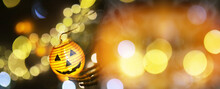 Halloween - Jack O' Lanterns. The Concept Of Light On The Night Halloween.Round Lamp Shape Of Pumpkin Used To Decorate With Bokeh.