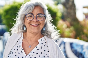 Poster - Middle age woman smiling confident standing at park