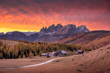 Incredible Red Sunset At Fuchiade Valley In Italian Dolomites Countryside