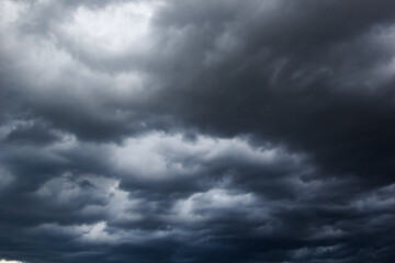 Aufkleber - The dark sky with heavy clouds converging and a violent storm before the rain.Bad or moody weather sky and environment. carbon dioxide emissions, greenhouse effect, global warming, climate change.