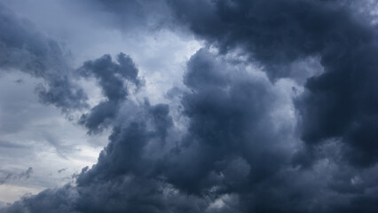 Aufkleber - The dark sky with heavy clouds converging and a violent storm before the rain.Bad or moody weather sky and environment. carbon dioxide emissions, greenhouse effect, global warming, climate change.