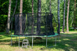 Children's garden trampoline with safety net