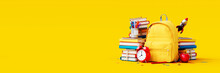 Yellow School Bag With Books And Accessory On Yellow Background. Back To School Concept 3D Rendering, 3D Illustration