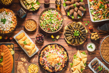 Arabic Cuisine;  Middle Eastern Traditional Dishes And Assorted Mezze Or Meze. Vine Leaves, Kibbeh, Spring Rolls, Sambusak, Kibbeh Nayyeh, Makdous, Haloumi Cheese, Olives, Hummus And Yogurt Salad.