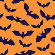 Vector illustration of Halloween bat silhouette pattern seamless on orange background