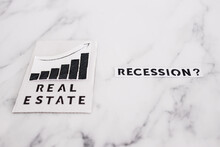 Recession Text With Question Mark Next To Real Estate Stats Going Up, Post Pandemic Economy