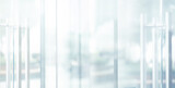 Blurred images of glass wall with city town background.modern abstract window