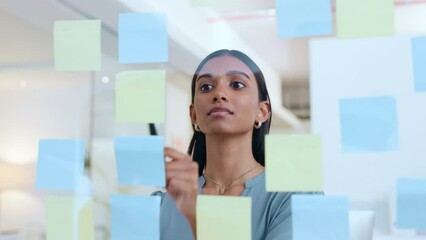 Poster - Young woman scheduling work strategy. Business female brainstorming, planning work showing corporate leadership, management skills. Lady taking detail information on tasks for company objectives.