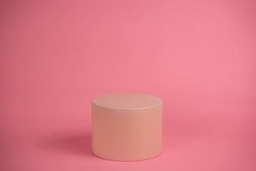 Poster - Empty podium for display cosmetic product. Platform arrangement in pink pastel color in trendy minimalist style. Composition of cylinders and cubes layout for feminine background