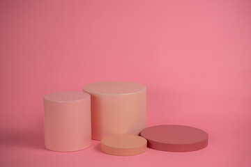 Poster - Empty podium for display cosmetic product. Platform arrangement in pink pastel color in trendy minimalist style. Composition of cylinders and cubes layout for feminine background