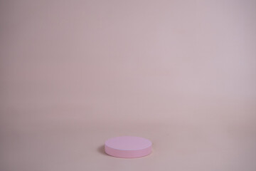 Poster - Empty podium for display cosmetic product. Platform arrangement in pink pastel color in trendy minimalist style. Composition of cylinders and cubes layout for feminine background
