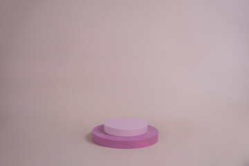 Poster - Empty podium for display cosmetic product. Platform arrangement in pink pastel color in trendy minimalist style. Composition of cylinders and cubes layout for feminine background