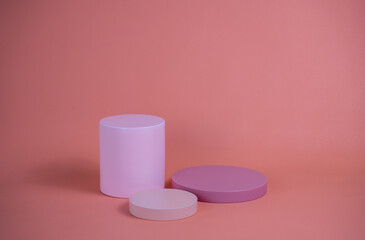 Poster - Empty podium for display cosmetic product. Platform arrangement in pink pastel color in trendy minimalist style. Composition of cylinders and cubes layout for feminine background