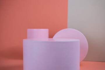 Poster - Empty podium for display cosmetic product. Platform arrangement in pink pastel color in trendy minimalist style. Composition of cylinders and cubes layout for feminine background