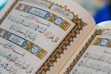 quran open book page closeup