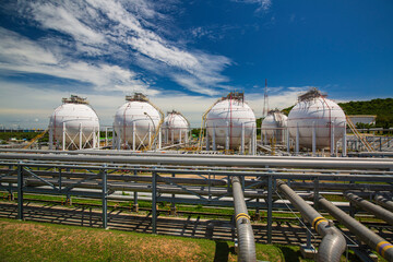 Wall Mural - White spherical propane tanks containing fuel gas