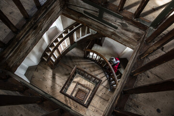 Looking down the wooden staircase of Lindau's lighttower, Lake Constance, Germany